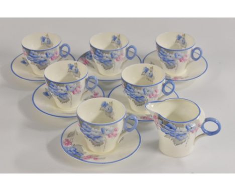A Shelley Ideal China six setting demi-tasse coffee service, comprising teacups, saucers and milk jug, printed with flowers a