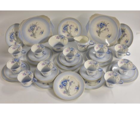 A Shelley Regency shape tea service, comprising eleven teacups, twelve saucers, twelve side plates, cream jug, sugar bowl and