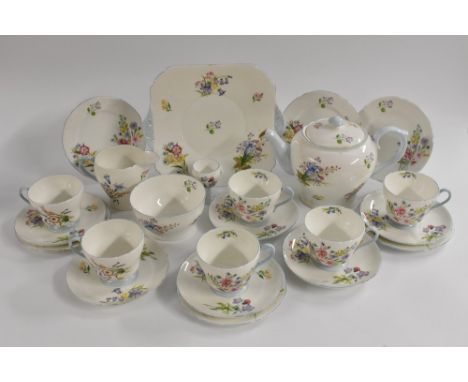 A Shelley Henley shaped Wild Flowers pattern tea service, for six comprising teapot, milk jug, sugar bowl, bread plate, teacu