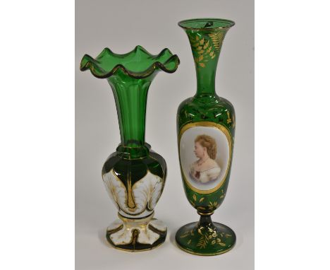 A late 19th century Bohemian emerald glass  pedestal slender ovoid vase, applied with an oval portrait panel of a lady, he gr