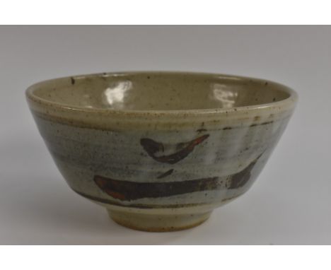 Leach Pottery St Ives  - a bowl in the manner of Bernard Leach, painted with a band of stylised swimming fish in brown tones 