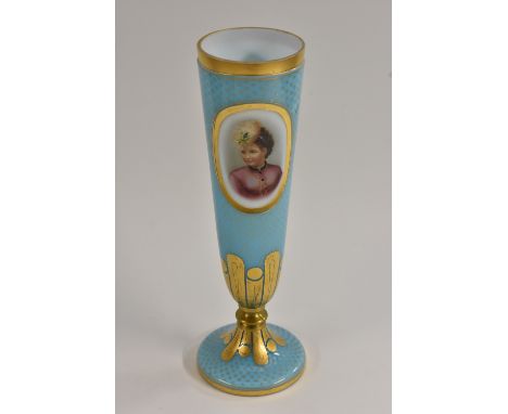 A 19th century pedestal opaque glass vase,  with portrait oval