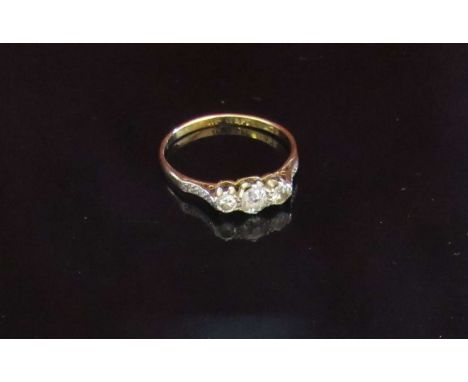 An 18ct gold platinum set three stone diamond ring .40ct total approx. Size Q/R, 2.1g