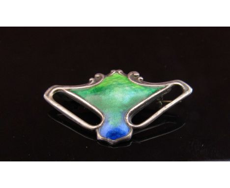 An Art Nouveau silver and enamel brooch by Victor Luxenberg (goldsmiths emporium), 4cm x 2.3cm