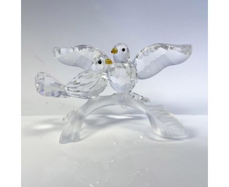Part of the Feathered Beauties collection, this figural is a stunning piece to display with their faceted crystal bodies, amb