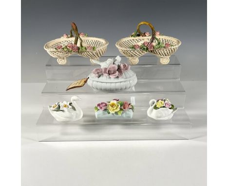 Made in England and Germany. Baskets are light tan with pink roses. Container with two birds and pink roses on the lid. Two s