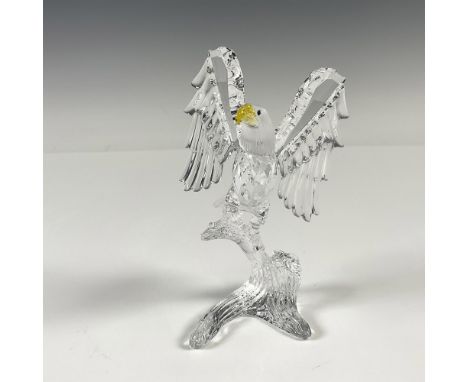 Figural is made from faceted sparkling clear crystal with contrasting frosted smooth crystal for depth and luster. It has a l
