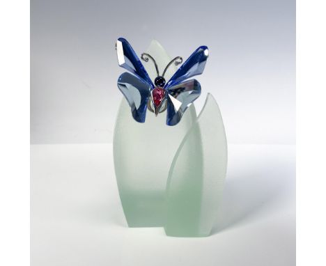 Brilliant blue and pink crystal attached to a green satin resin leaf. Butterfly is magnetized to attach to leaf. Swarovski ba
