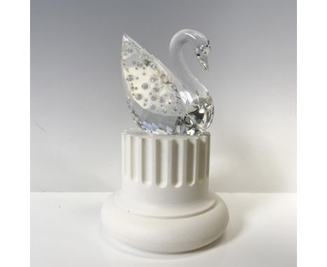 Figural was created to commemorate the 100th year of the Swarovski brand and is adorned with 100 rhinestone crystals. A white