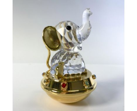 Part of the Times Past series figural is adorable sitting on gold half dome round adorned with colored crystals. Clear crysta