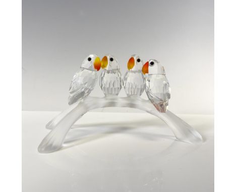 Part of the Feathered Beauties theme group. Four faceted clear crystal figures perched on a frosted three-pronged arch branch