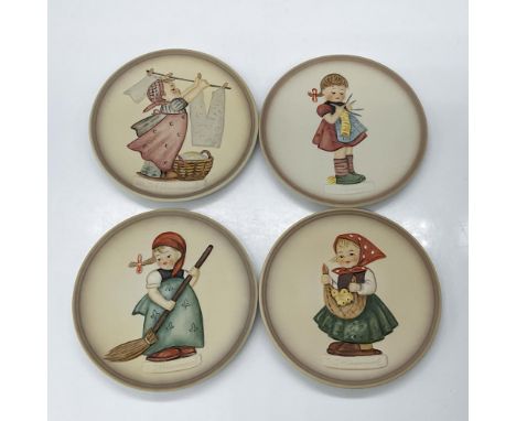 These charming hand painted plates depict the cute Goebel Hummel characters doing chores. Set of 4 plates HUM 745-748. Goebel