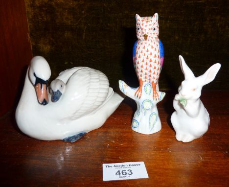 Royal Copenhagen white hare, model 1019 by Christian Thomsen, a Copenhagen swan and cygnet model 360, and a Herend owl on bra