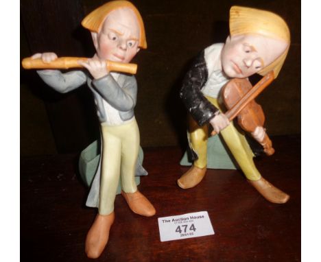 Two German bisque comical musician match holder figures by Schafer &amp; Vater