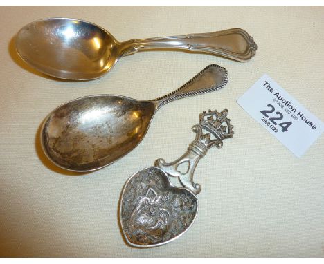 Heart-shaped silver caddy spoon with romantic scene to bowl, plus two others, hallmarked&nbsp;Edinburgh, 1906&nbsp;