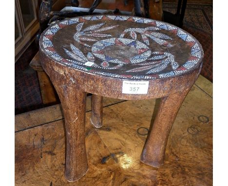 Tribal Art:- African carved wood Zulu chief's stool with inset beadwork decorated seat on tripod legs