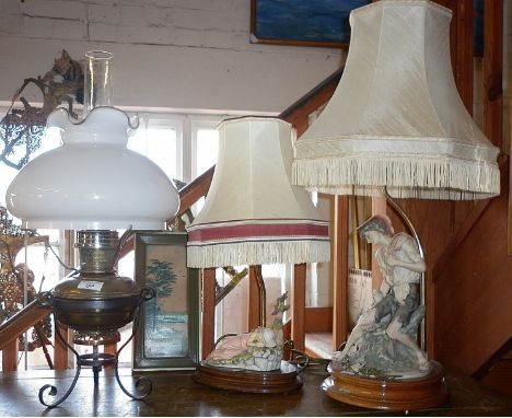 Brass oil lamp and two resin figural table lamps