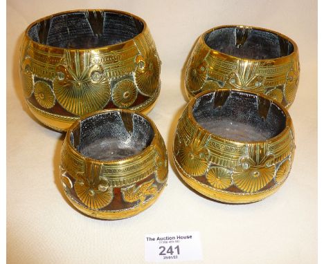 Tribal Art:- Early 20th c. Anglo-Indian coconut and brass set of four graduated Dhokra grain measures or bowls from Orissa (S