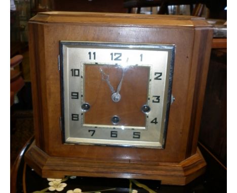 Art Deco satinwood mantle clock with rosewood inlay and having Westminster chimes movement