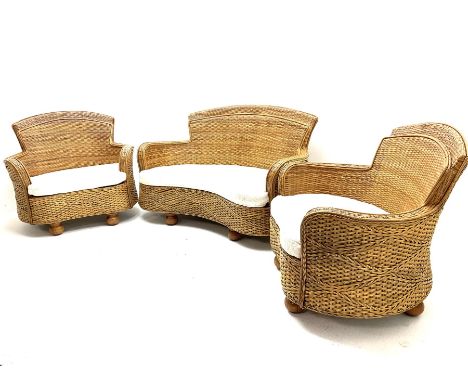 Rattan conservatory suite, to include a two seat sofa (W135cm) and two matching armchairs (W94cm), upholstered with matching 