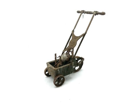 Vintage cast iron tennis court line marker, together with peg and line guide 