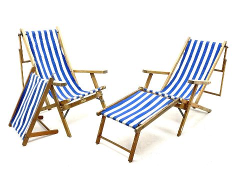 Geebro - �The Ocean Chair� two vintage beech framed folding deck chairs with blue and white striped fabric Dimensions: Length