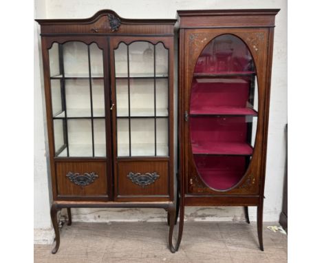 An Edwardian mahogany display cabinet, with an arched top with glazed doors and sides on cabriole legs together with another 