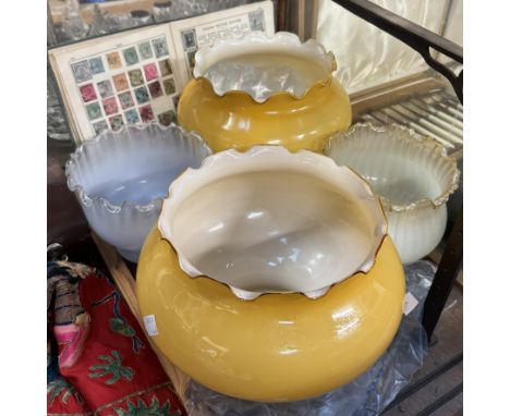 Opaque glass lamp shades together with a stamp album