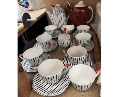 A Midwinter Zambesi pattern part coffee service together with a Susie Cooper coffee pot