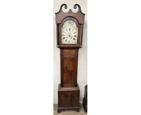 A 19th century oak longcase clock, with a broken swan neck pediment above a short trunk door, box base and bracket feet, the 