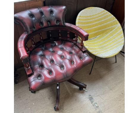 An office chair with a button back and spindle uprights together with a mid 20th century yellow and white plastic woven satel