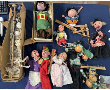 A Pelham puppet Giant together with a collection of Pelham puppets including a skeleton, Punch and Judy, Witches etc 