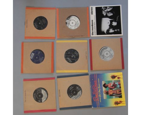 A collection of fifty plus 7" vinyl singles including The Monkees, Beach Boys, Mike Oldfield, The Turtles, The Rolling Stones