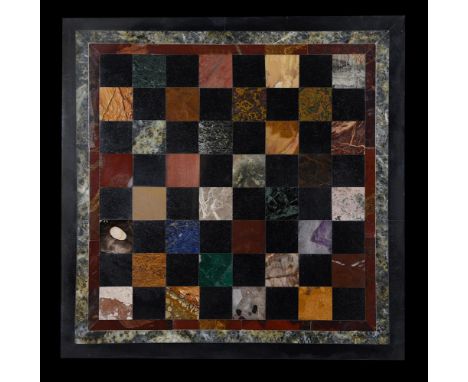 A black slate specimen marble inlaid table top, 20th century, with inset chess board pattern, the black squares uniform the '