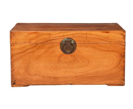 Two similar Chinese patinated leather trunks, the larger 35cm high, 82cm wide, 55cm deep, together with a camphorwood trunk, 