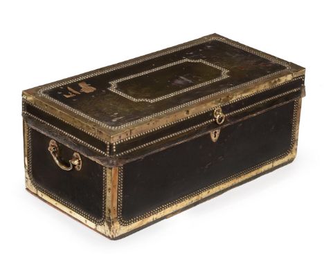 A studded leather and brass bound trunk, first half 19th century, 32cm high, 78cm wide, 39cm deep 