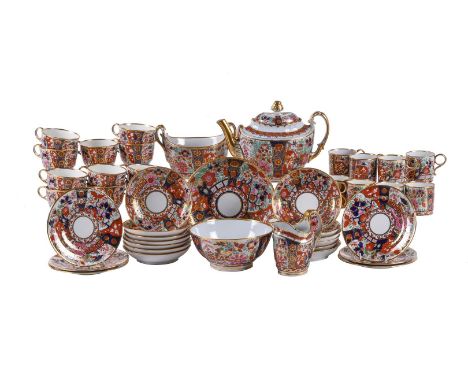 A Worcester (Barr) 'Japan' pattern part tea and coffee service, circa 1800 comprising: eleven tea cups, eight coffee cups, th