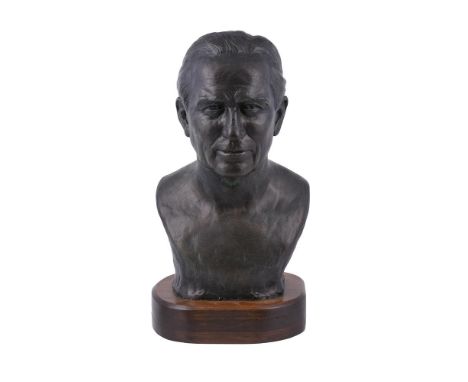 A bronzed composition bust of Edward Johnson, inscribed 'Roly Harkness Hamilton?', on a stained wood plinth, 55cm high overal