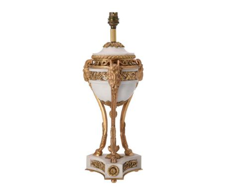 A French marble and gilt metal table lamp, late 19th century and later fitted for electricity, the underside indistinctly sta