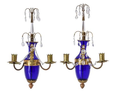 A pair of Baltic blue glass two light wall lights, possibly Swedish, 20th century, each with double spray surmount above blue