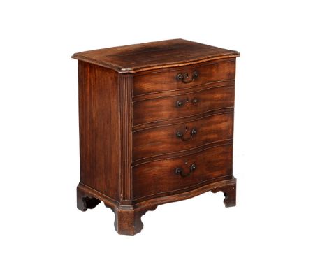 A George III mahogany night commode or thunder-box, circa 1780, in the form of a serpentine fronted chest of drawers, 74cm hi