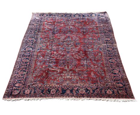 A Mohajeran carpet, approximately 353 x 260cmCondition Report: Some wear overall. Some patches of additional wear to central 