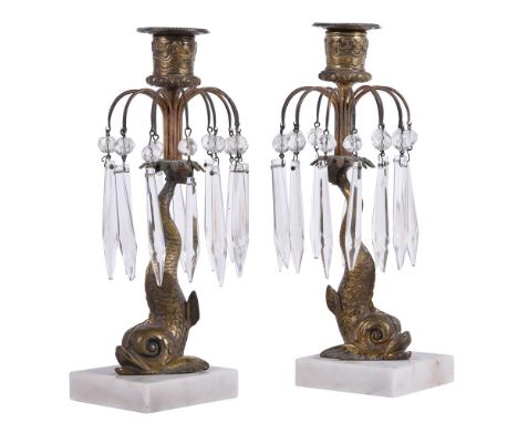 A pair of gilt metal and marble lustre candlesticks, 19th century, the sconces above the faceted drops and dolphin pattern su