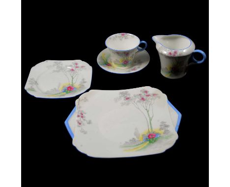 Shelley, a part coffee service, Regent shape, comprising eight cups, twelve saucers, eleven side plates, milk jug, sugar basi