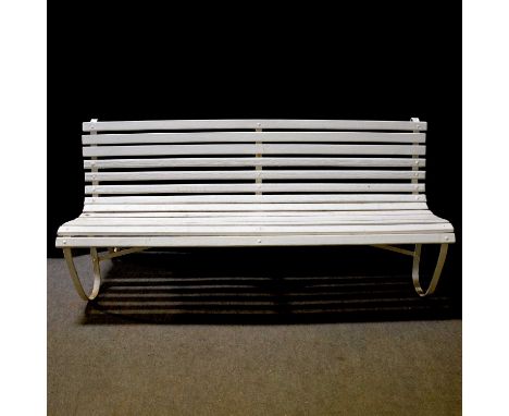 White painted garden bench, cast aluminium ends with scrolled vine design painted in black, width 129cm; and another white pa