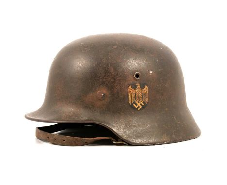 German Third Reich M40 Army helmet, one side decal, stamped ET for Eisenhuttenwerk Thale, size 64, also stamped 379, with lea