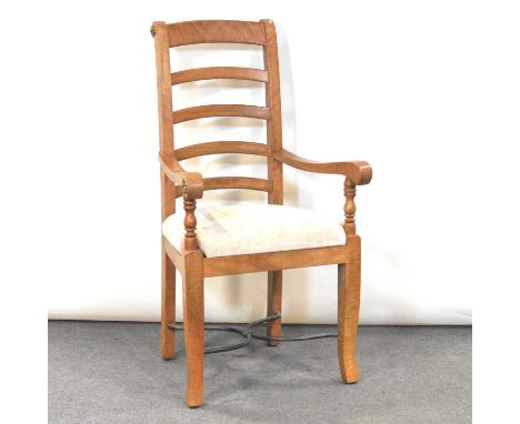 Modern ash elbow chair, ladder back, splayed legs joined by a metal stretcher, width 61cm, height 109cm.