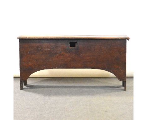 Oak six plank coffer, hinged lid with moulded edge, chip carved corners, 126x38cm, height 61cm.Condition report:Please see ad