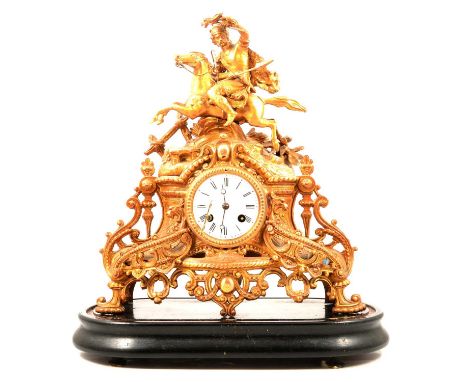 French gilt spelter mantel clock, the case mounted with a horse and rider, circular enamelled dial, cylinder movement strikin