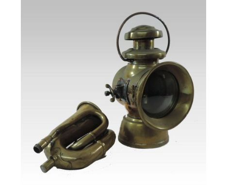 An early 20th century Lucas brass automobile lamp, circa 1915, inscribed Lucas King of the Road and numbered 742, 34cm tall, 